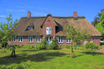 Thatch-Roofed Brick Cottage Download Jigsaw Puzzle