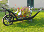 Decorative Wooden Wheelbarrow Download Jigsaw Puzzle